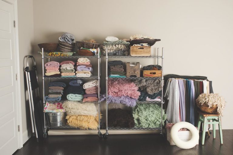 knitting clothes with accessories on wooden shelf