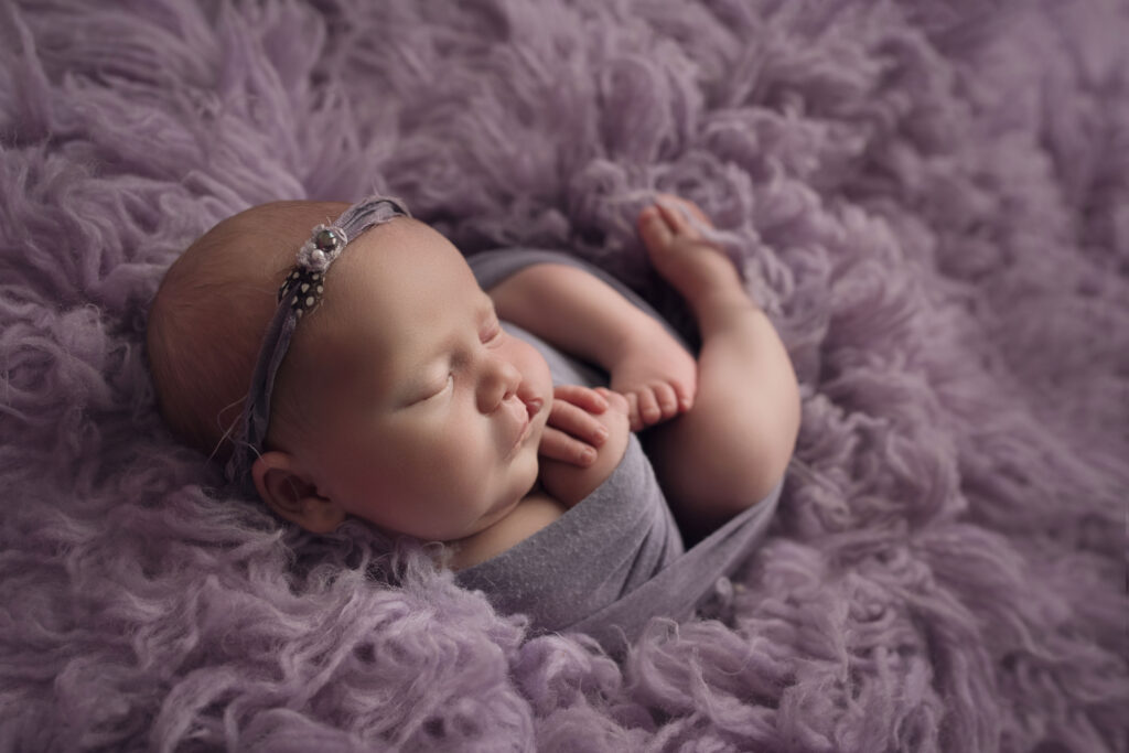 newborn photographer raleigh nc Baby girl with cleft palate in purple fur