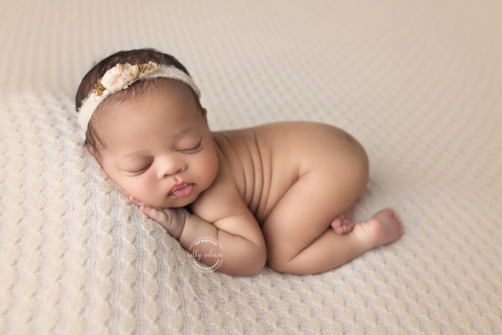 Newborn Photography Raleigh NC Newborn Baby Girl bum up laying on cream lace