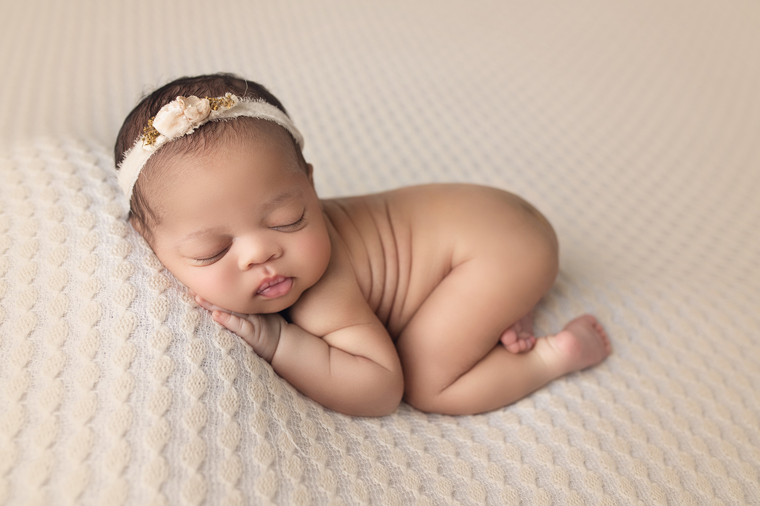 ### Newborn Baby Girl bum up laying on cream lace