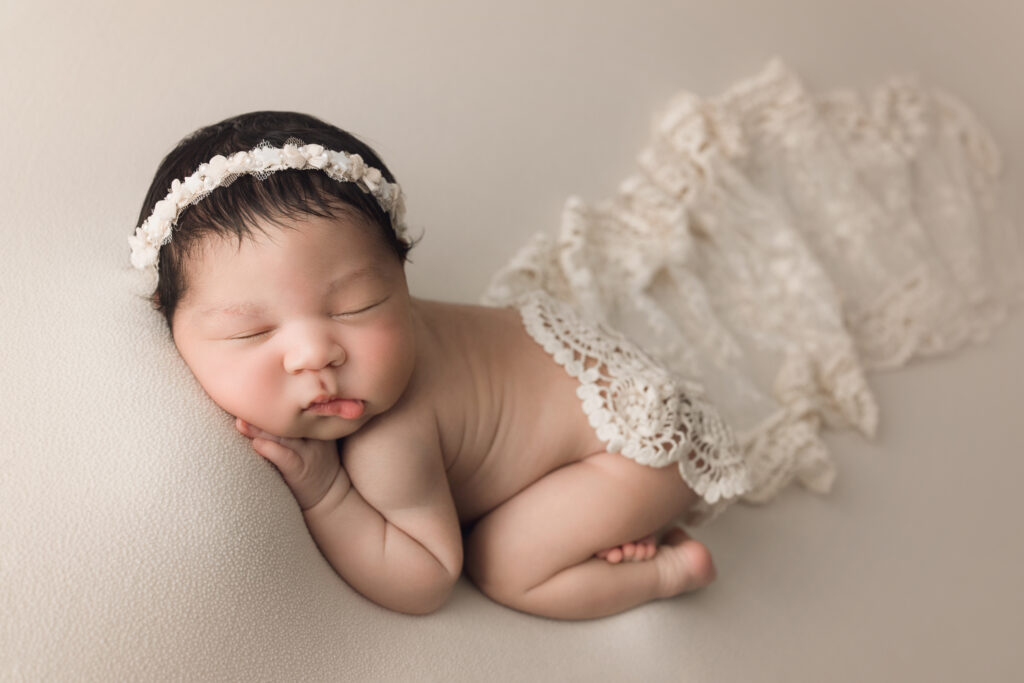 Newborn Baby Girl with bum up and lace wrap Newborn Photography Raleigh